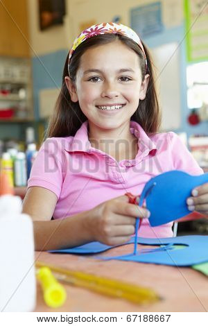 Pre teen girl in art and craft class