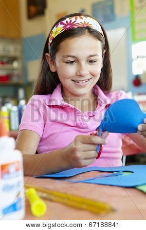 Pre teen girl in art and craft class