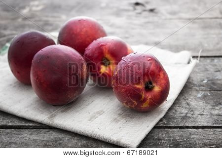 Peaches Over Wooden Background