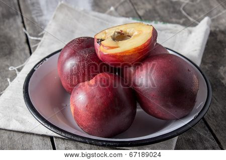 Peaches Over Wooden Background