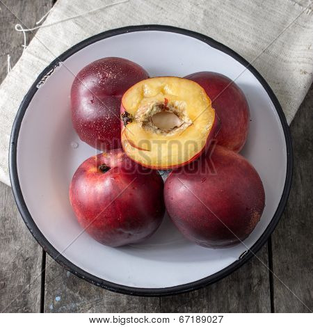 Peaches Over Wooden Background