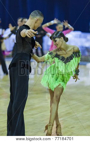 Minsk-belarus, October 4,2014: Unidentified Professional Dance Couple Performs Youth-2 Latin-america