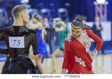 Minsk-belarus, October 4,2014: Unidentified Professional Dance Couple Performs Youth-2 Latin-america