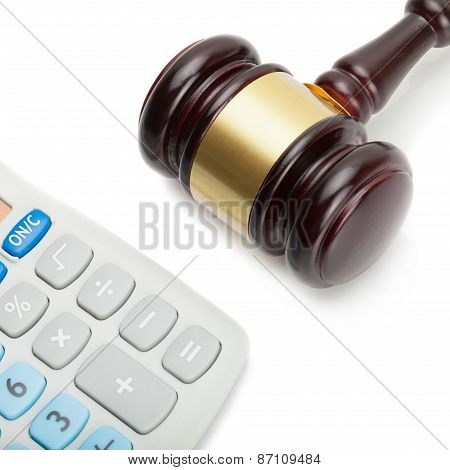 Wooden Judge's Gavel Next To Neat Calculator