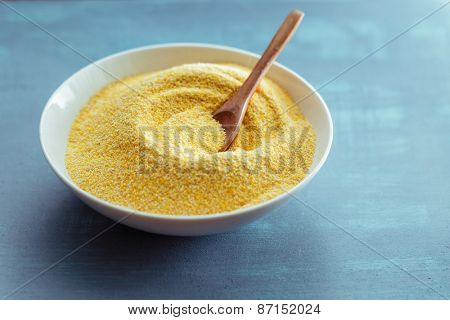 Dried polenta in white bowl