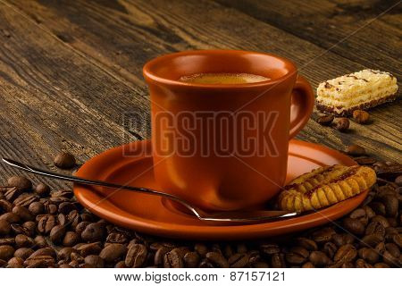 Cup Of Coffee, Sweet And Coffee Beans