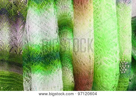 Green Shawls On Store Counter.