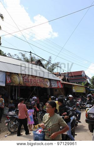 People Along The Street Of A Little Rural Village