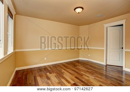 Unfurnished Room With Hardwood Floor.