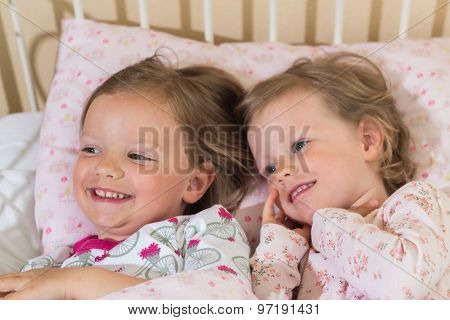 Beautiful Little Girls (sisters) In The Crib.