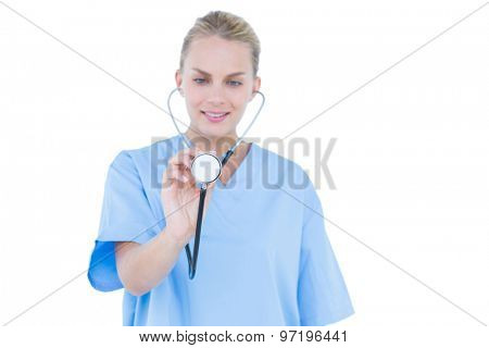 blond female doctor against white background