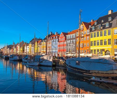 COPENHAGEN DENMARK - MARCH 11 2017: Copenhagen Nyhavn district. Nyhavn was constructed by King Christian V from 1670 to 1673 dug by Swedish prisoners of war from the Dano-Swedish War 1658-1860