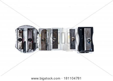 Different Old Used Silver Metallic Steel Plastic Pencil Sharpener.