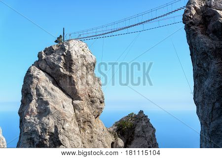 The rope bridge on the Mount Ai-Petri. Ai-Petri is one of the highest mountains in Crimea and tourist attraction.