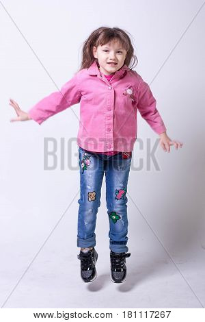 Little beautiful girl on a white background