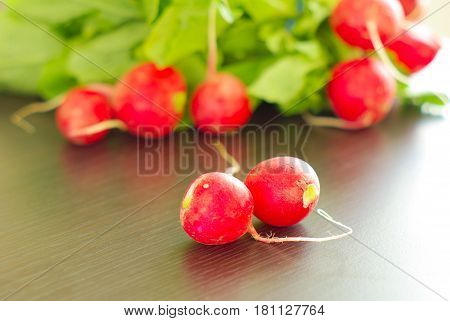 Radish fresh salad ingredients. Red root vegetable. Organic vegetarian food. Dieting healthy cooking.