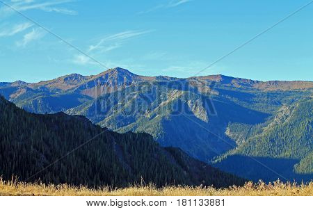 Vista of Distant Forested Mountains at Sunrise in Eastern Oregon USA