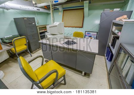 HONOLULU, OAHU, HAWAII, USA - AUGUST 21, 2016: technological office with computers and teletypewriters of Battleship Missouri at Pearl Harbor. The end World War II was signed on this warship
