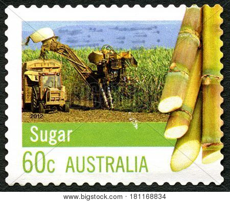 AUSTRALIA - CIRCA 2012: A used postage stamp from Australia celebrating the sugar making process circa 2012.