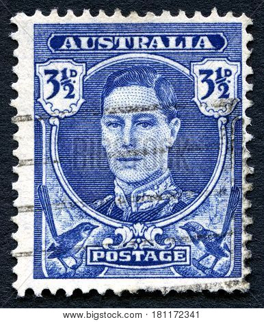 AUSTRALIA - CIRCA 1942: A used postage stamp from Australia depicting a portrait of King George VI circa 1942.
