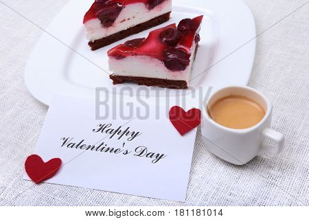 Slice of handmade cherry pie on a plate and classic espresso coffee in white background.