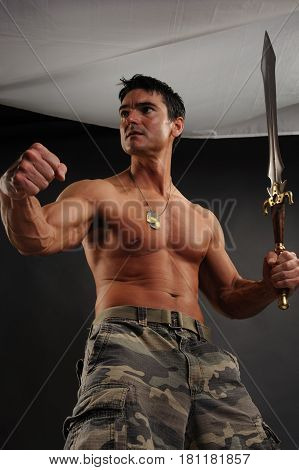 The strong military man is ready for battle.