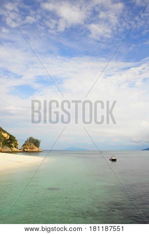 paradise sea landscape with white sand and emerald ocean shore in Rawa Island Malaysia on a summer day in holiday resort and tropical vacation trip and travel destination concept