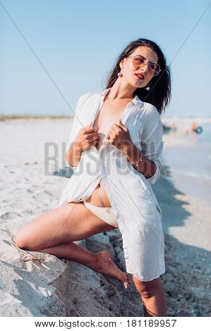 Sexy bikini girl posing at beach She is incredible
