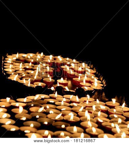 Candles Lit With The Warm Flame During The Religious Ceremony