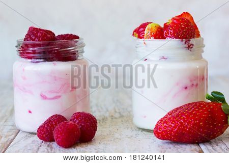 Homemade yogurt with sweet strawberries and raspberries
