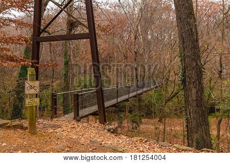 Steel span bridge in the Lullwater Park Atlanta USA
