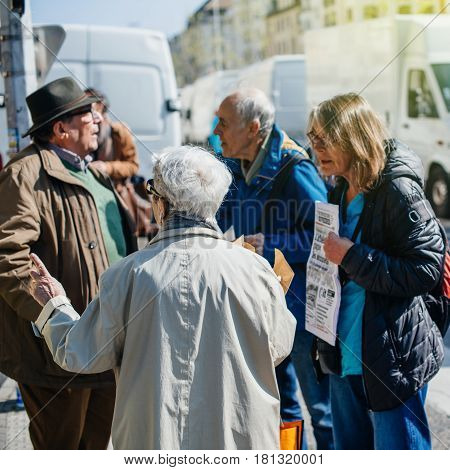 STRASBOURG FRANCE - APR 8 2017: Political agitation at French market for the upcoming French presidential election 2017 - political discussion at French market