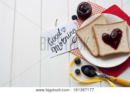 beautiful background with bread and jam on the white wooden table