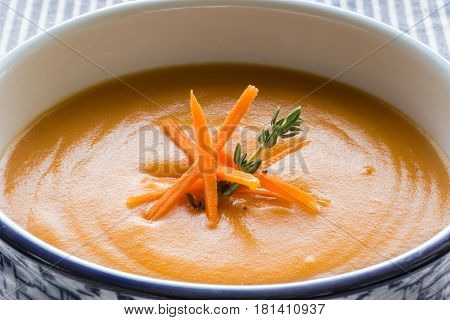 Carrot Soup Served in Bowl. Homemade Cream Carrot and Potato Pottage.