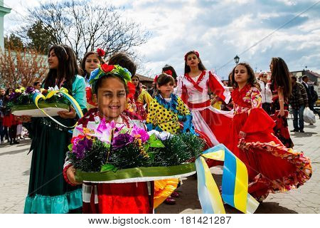 Uzhhorod Ukraine - April 7 2017: Participants in the celebration of the International Roma Day perform Romany folk dances in the city center.