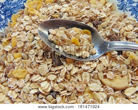 tasty cereals or muesli for breakfast with raisins
