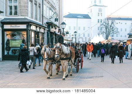 Austria, Salzburg, January 01, 2017: the Horse. Entertainment of tourists (horseback riding) in the Austrian city of Salzburg - hometown of Mozart. Vacation, holidays, attractions.