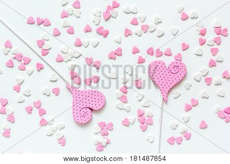 Colorful candies design on white texture background top view pattern