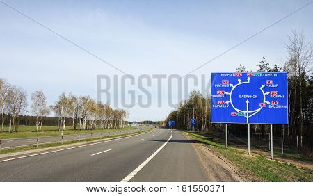 Roundabout road sign in Belarus.Translation to English:Babruysk roundabout sign