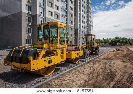 Heavy tandem Vibration roller compactor at asphalt pavement works for road repairing