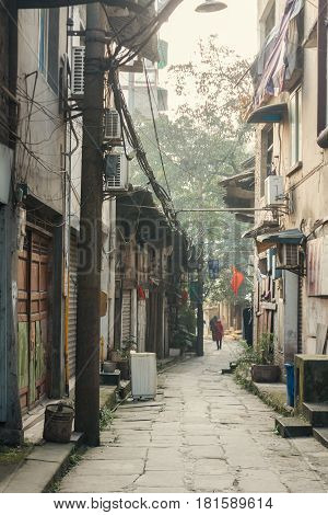 25Dec 2015ChinaChongqing : a traditional village and house Beside the famous travel attractions Ciqikou city of ancient and historical shophouseslocals walking throught old house