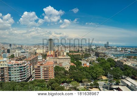 Aerial view of Barcelona city on a sunny day