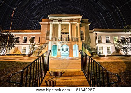 November 2016 town of Walterboro South carolina USA - Twon of walterboro courthouse at night with star trails in the background