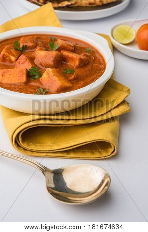 paneer butter masala or cheese cottage curry, popular indian lunch/dinner menu in weddings or parties, selective focus