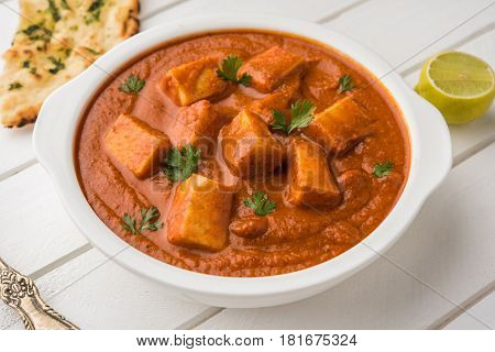 paneer butter masala or cheese cottage curry, popular indian lunch/dinner menu in weddings or parties, selective focus