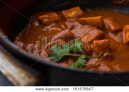paneer butter masala or cheese cottage curry, popular indian lunch/dinner menu in weddings or parties, selective focus
