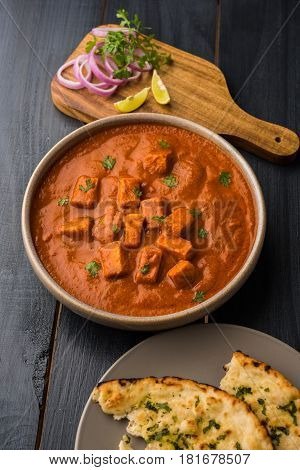 paneer butter masala or cheese cottage curry, popular indian lunch/dinner menu in weddings or parties, selective focus