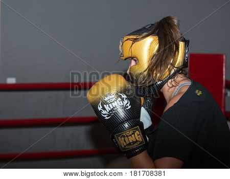 CRACOW POLAND - FEBRUARY 12 2016: Agnieszka Niestoj - talented Polish boxer durning boxing training with coach in the gym. Cracow Poland