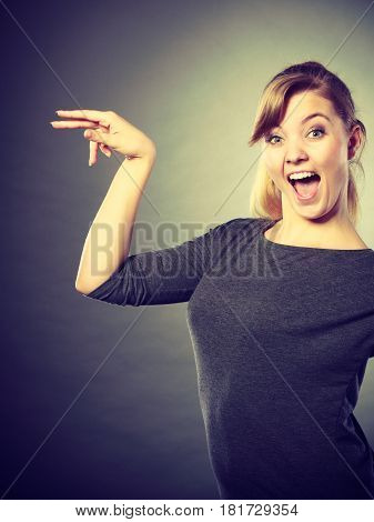 Leisure relax beauty concept. Cheerful girl fooling. Young laughing blond lady showing happiness expressing joy having fun.