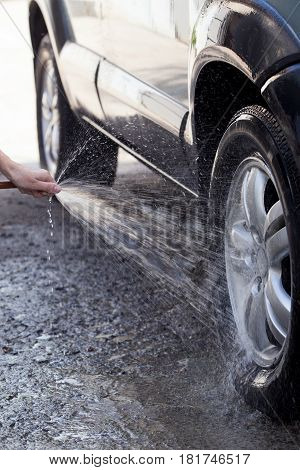 the car is washing in soap suds